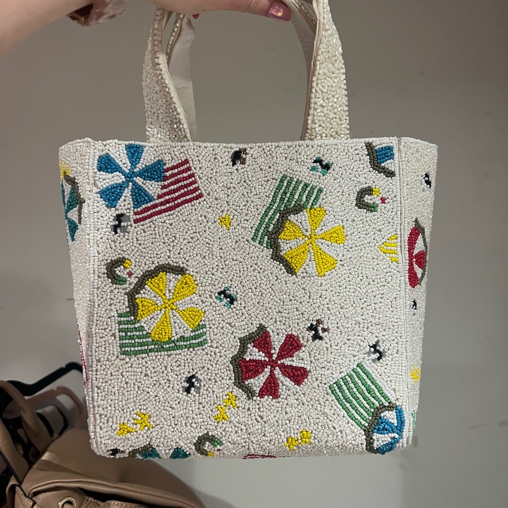 Discontinued viral Aerial beach Beaded Bag